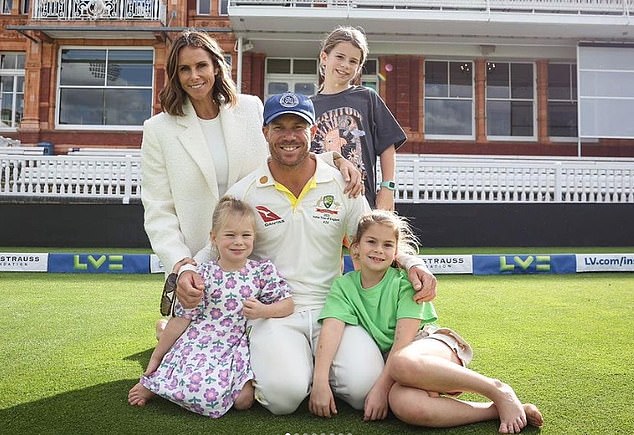 Warner, pictured here with wife Candice (top left) and their children at Lord's