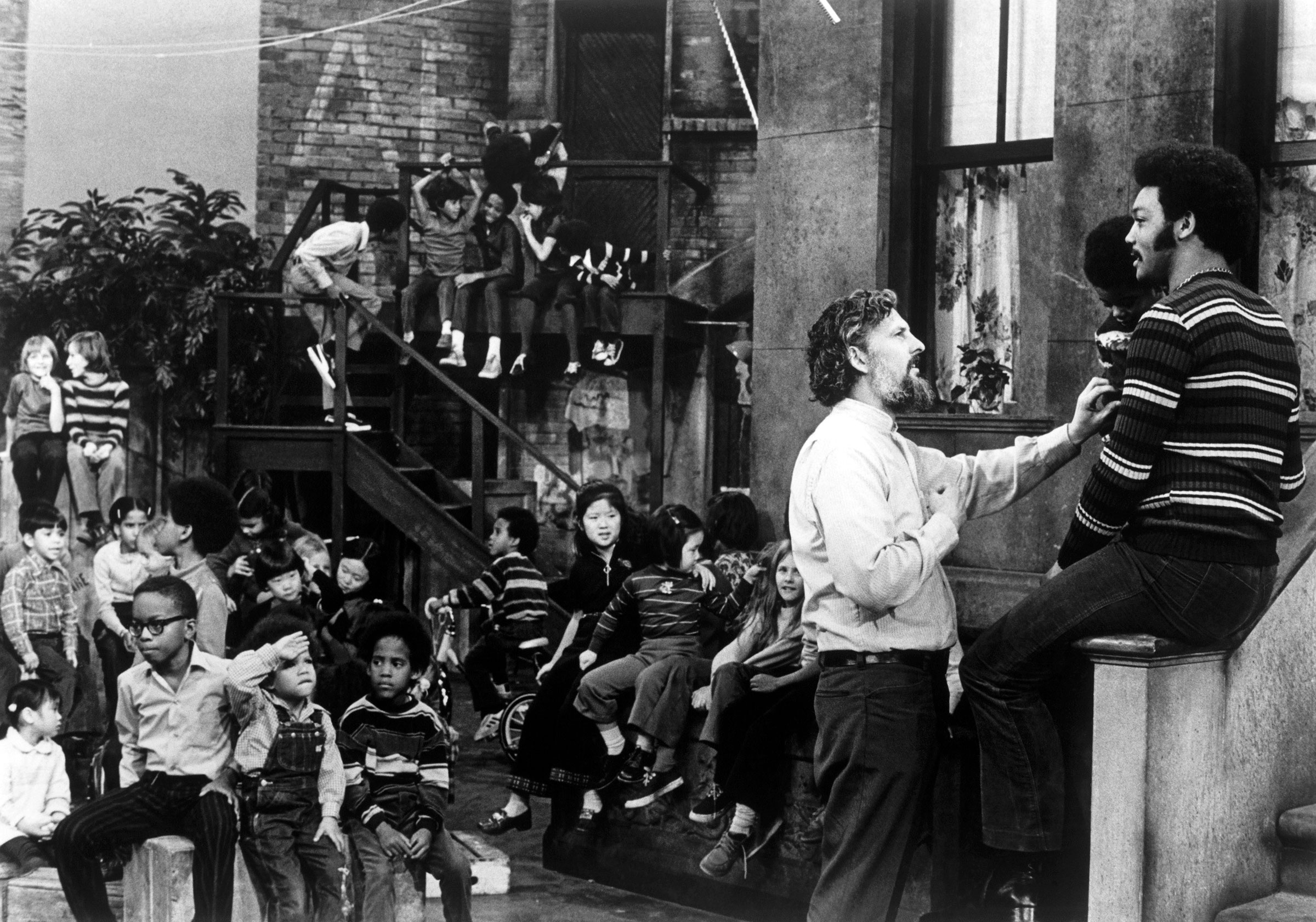 Executive producer Jon Stone and Rev. Jesse Jackson on-set on <em>Sesame Street</em> in 1972. (Everett Collection)