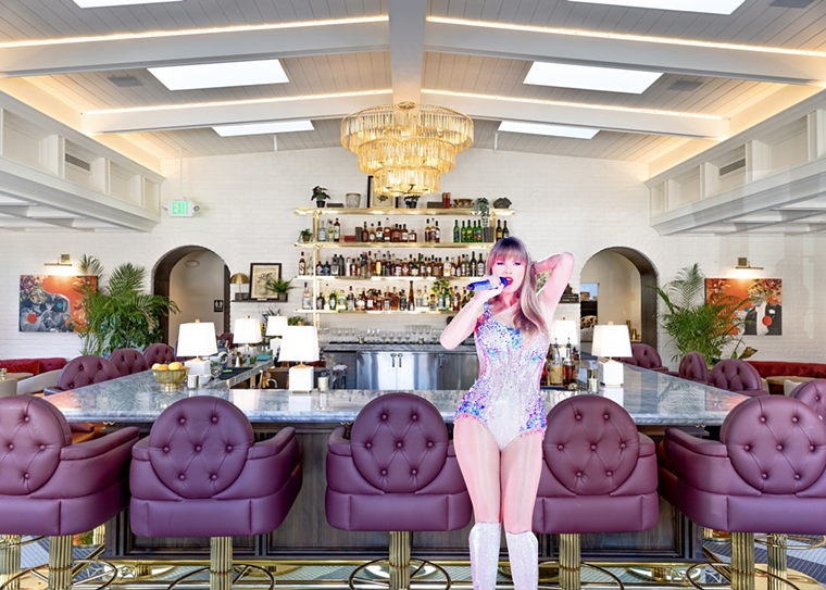 girl in a sparkly bodysuit holding a microphone in front of a bar with purple chairs