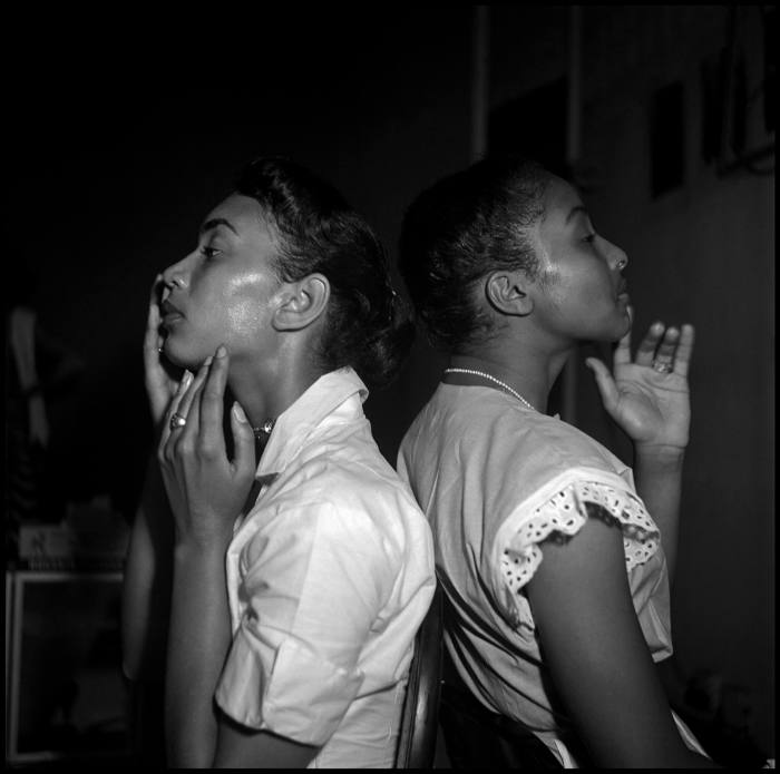 Two young black models backstage before a show at the Abyssinian Church in Harlem, 1950