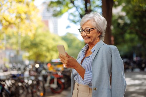 woman in colorful shirt and blazer