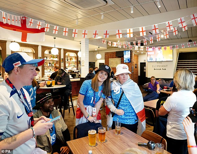 England fans rush to the pub in Australia ahead of their team's final group game in the World Cup
