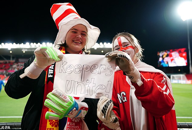 England fans show their support for goalkeeper Mary Earps with a sign reading 'Keepers unite'