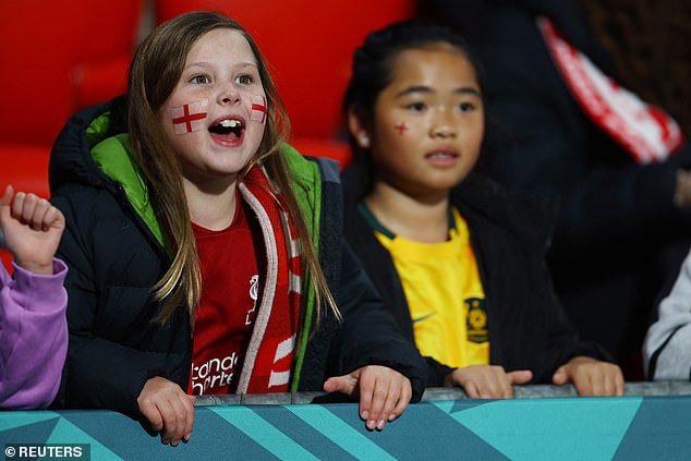 Two young England fans get excited ahead of the game's kick-off