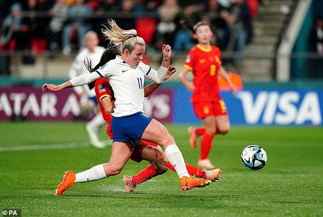Lauren Hemp of England takes a shot at goal in the opening minutes of the match