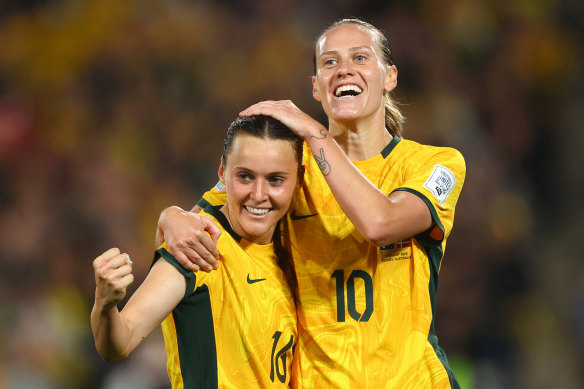 Hayley Raso and Emily Van Egmond celebrate after teaming up for Australia’s second goal.