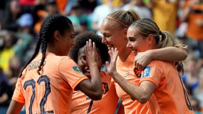 The Netherlands celebrate a goal, their distinctive bright orange helping to light up the tournament.