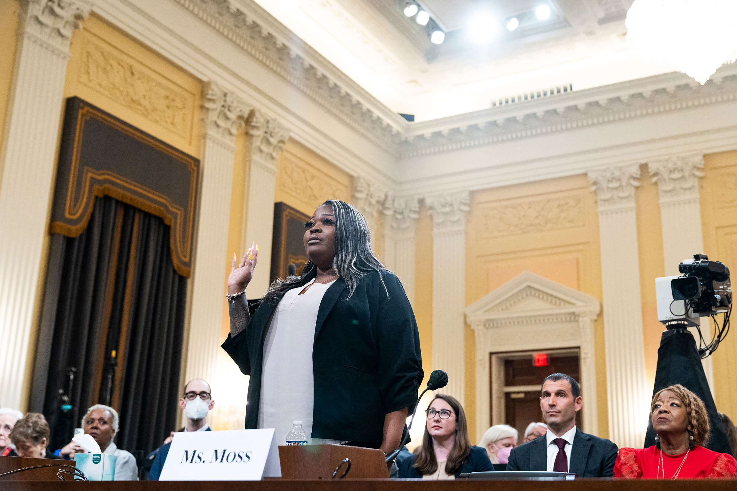 Shaye Moss is sworn into the Select Committee to Investigate the January 6th Attack on the United States Capitol fourth hearing to present previously unseen material and hear witness testimony in Cannon Building, Ruby Freeman on far right, on June 21, 2022. (Tom Williams—CQ-Roll Call/Getty Images)
