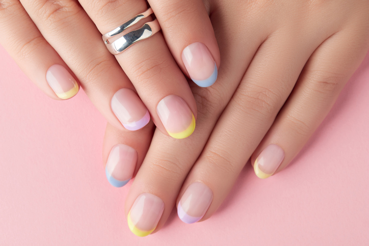 Colorful French tip short nails.