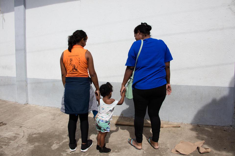 Two-year-old Grace, with her 10-year-old sister Aly and their mother, fled violence in Honduras, traveling for three months to get to Mexico. They hope to join the girls' father and brother who are already in the United States..