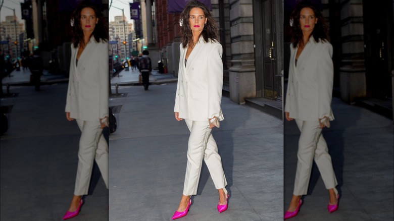 Katie Holmes in white pantsuit, pink heels
