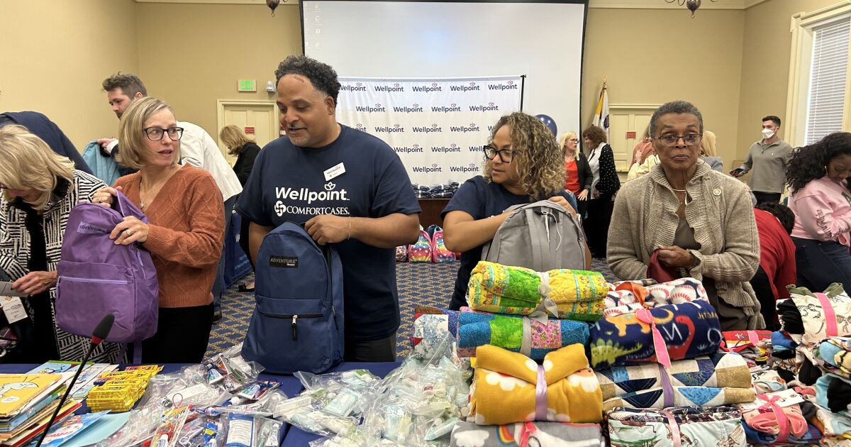 State leaders help pack 250 backpacks to support children entering foster care