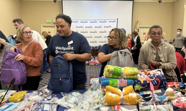 State leaders help pack 250 backpacks to support children entering foster care