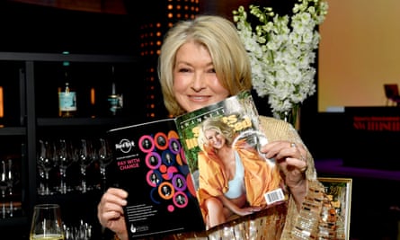 Martha Stewart holds a copy of the 2023 Sports Illustrated Swimsuit issue.
