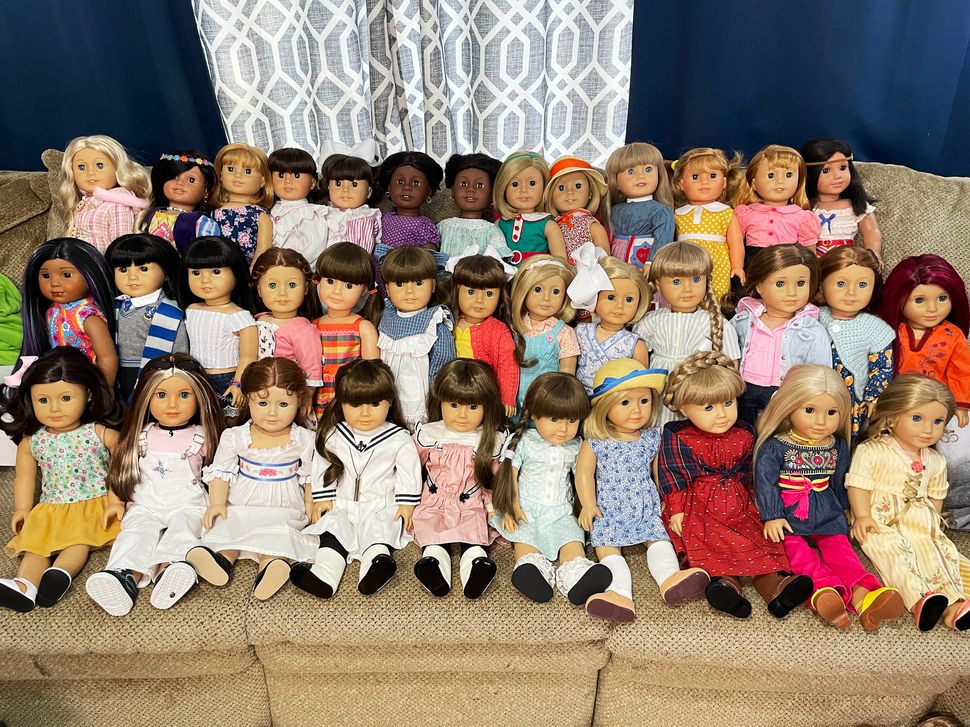Fristoe's collection of American Girl historical dolls.