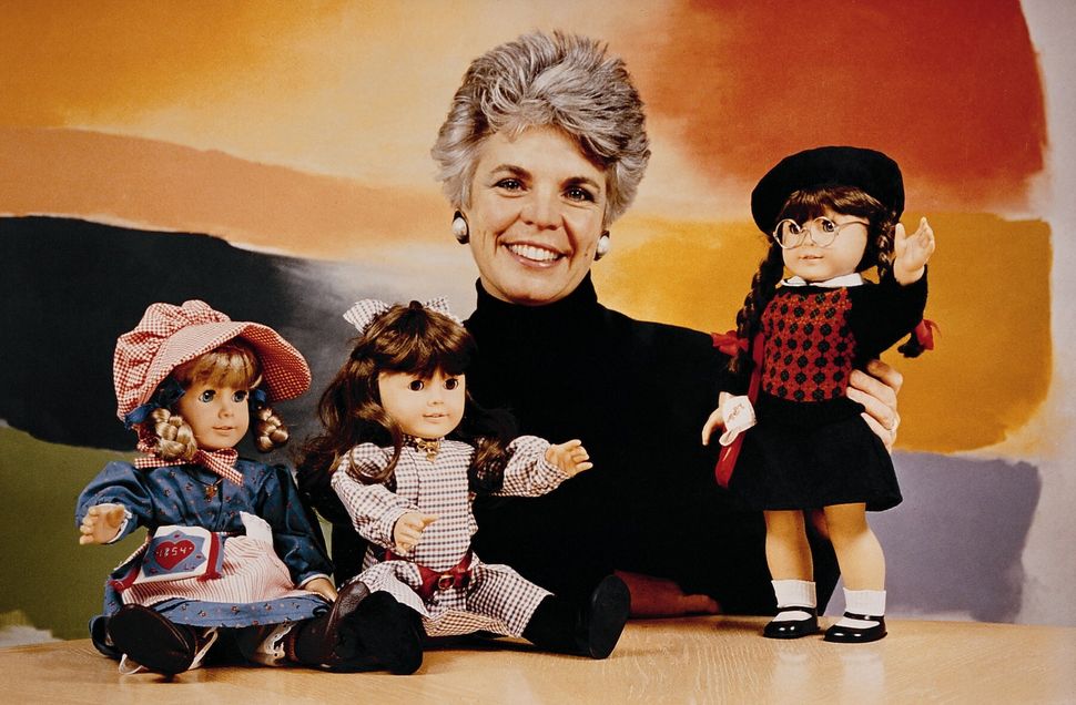 Rowland with original American Girl dolls: Kirsten, Samantha and Molly.