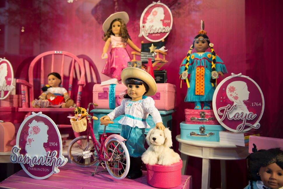 The recent approach to American Girl branding has involved brighter colors.