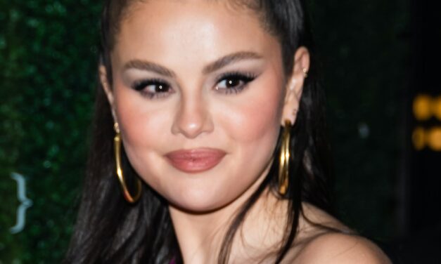 The Long & Fascinating History Of Hoop Earrings In Latinx Culture