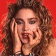 A portrait of Madonna on a red background.