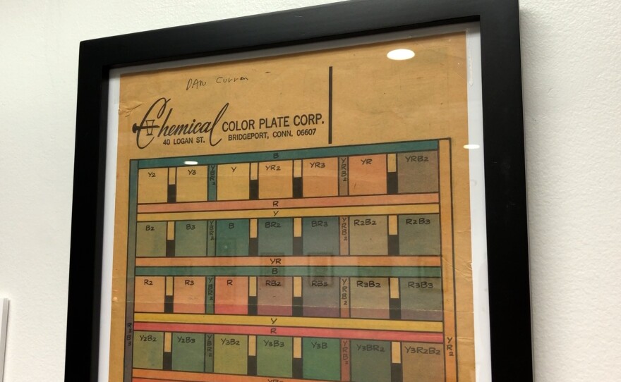 A framed color plate shows the colors available in early comic book printing on Oct. 3, 2023.