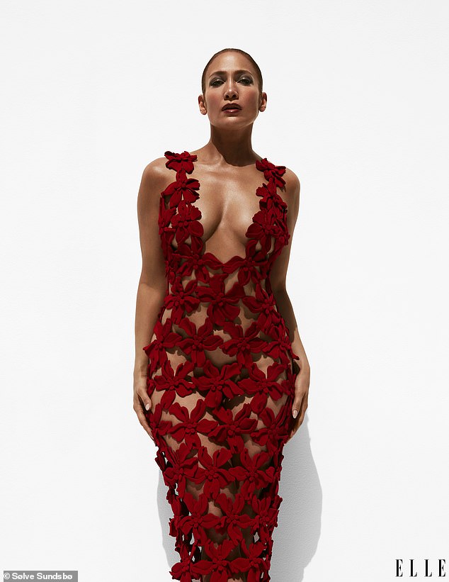 Jennifer Lopez, 54, went naked under a semi-sheer lace red dress to lead A-listers on ELLE's Women In Hollywood cover shoot as she said: 'Women just get sexier as they get older'