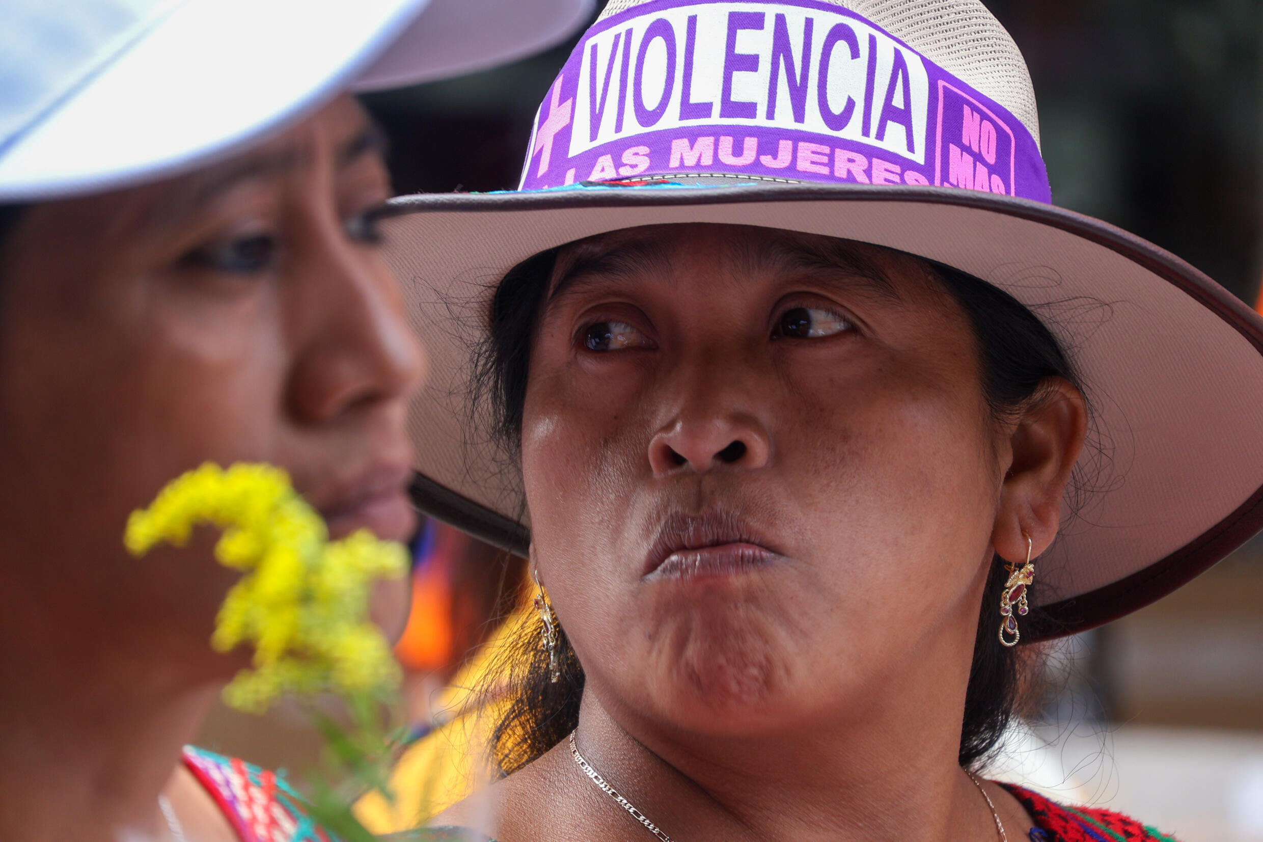 A woman takes part in a demonstration to demand justice for the victims of femicide in Guatemala City on November 25, 2023