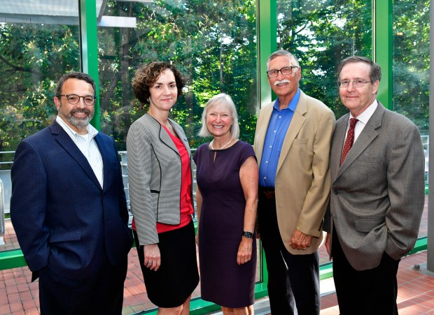 Delaware County Community College's new president Dr. Marta Yera Cronin, second from left, greeted DCCC Board of Trustees members and other key supporters. The others are, from left, David H. Grossman, trustee; Frances Sheehan, president, Foundation for Delaware County; Robert W. McCauley, trustee; Kevin B. Scott, chair of trustees. (COURTESY OF JIM ROESE)