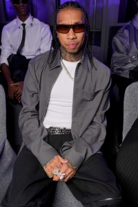 Tyga at Sacai Ready To Wear Spring 2024 on October 2, 2023 in Paris, France. (Photo by Swan Gallet/WWD via Getty Images)