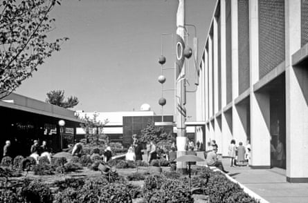 black and white image of mall exterior