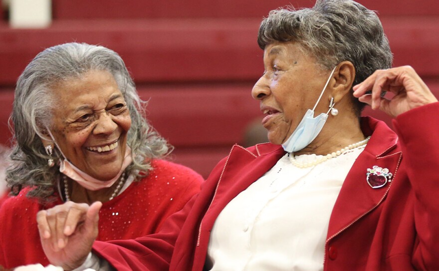 Greenview residents Martha, left, and Mary, right, share a laugh.