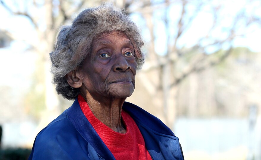 Isola Calhoun can see the backyard of her house from where she voted curbside.