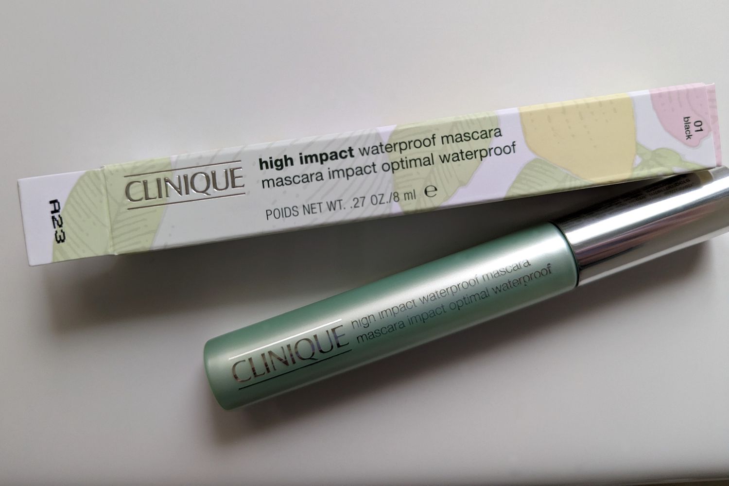 A tube of Clinique High Impact Waterproof Mascara next to its box